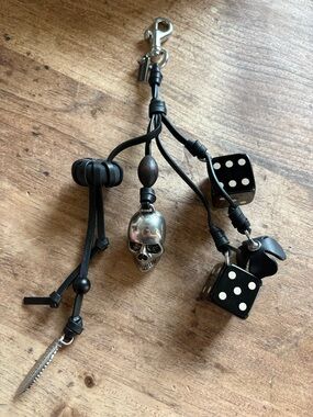 Coach dice cluster bag charm / keychain in black and chrome.